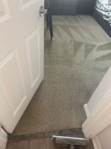 Freshly cleaned bedroom carpet in a Chino Hills home showing wand pass lines from professional steam cleaning